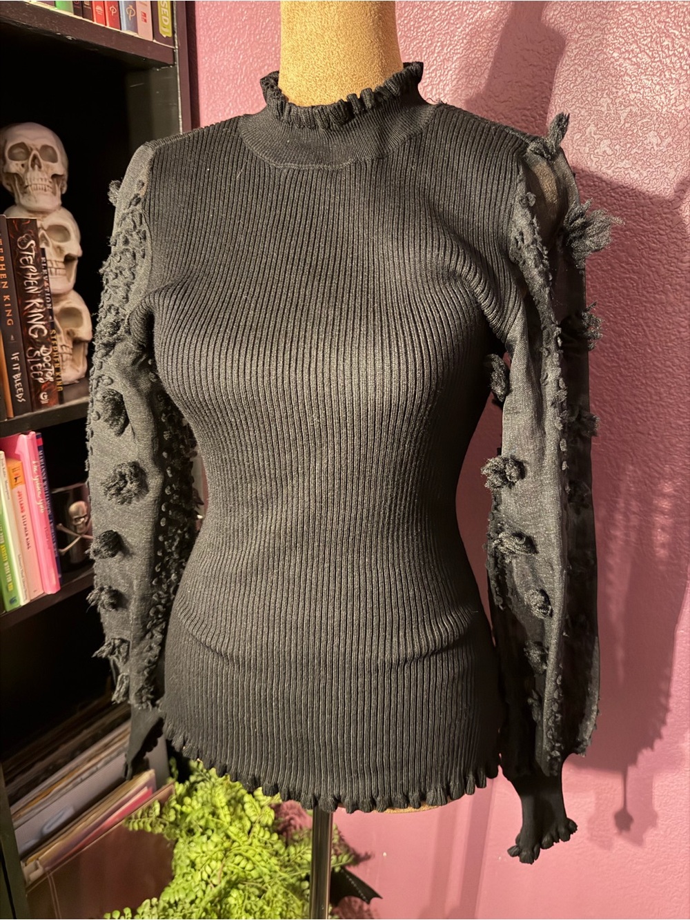 Black Ribbed Mock-Neck Sweater with Textured sheer Sleeves